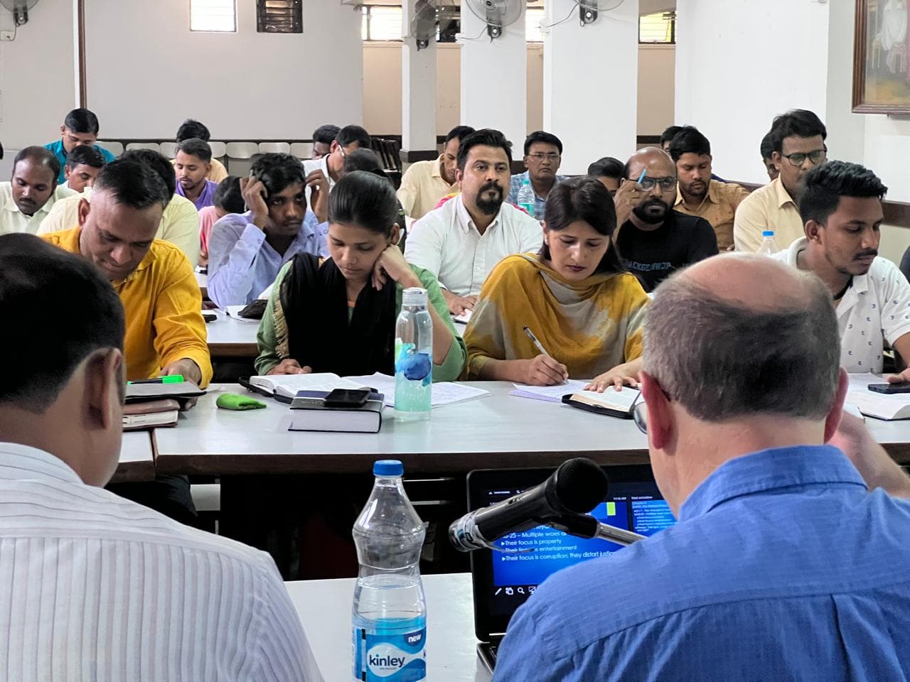 Professor teaching students at NIBS